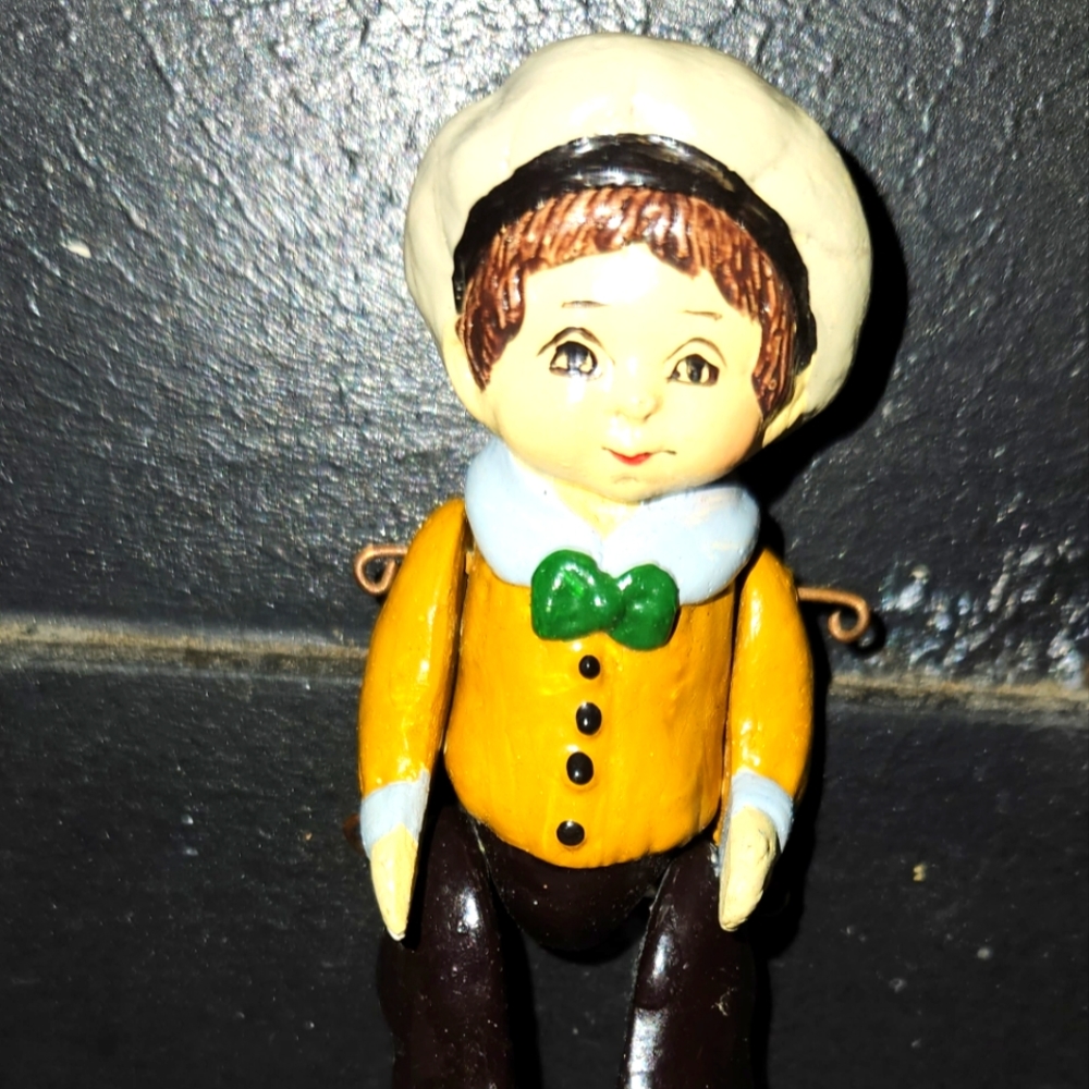 Marionette Boy from the Pinocchio story. Approximately 3 1/2" Tall.